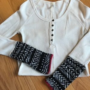 Free People ivory Henley with sweater cuffs.